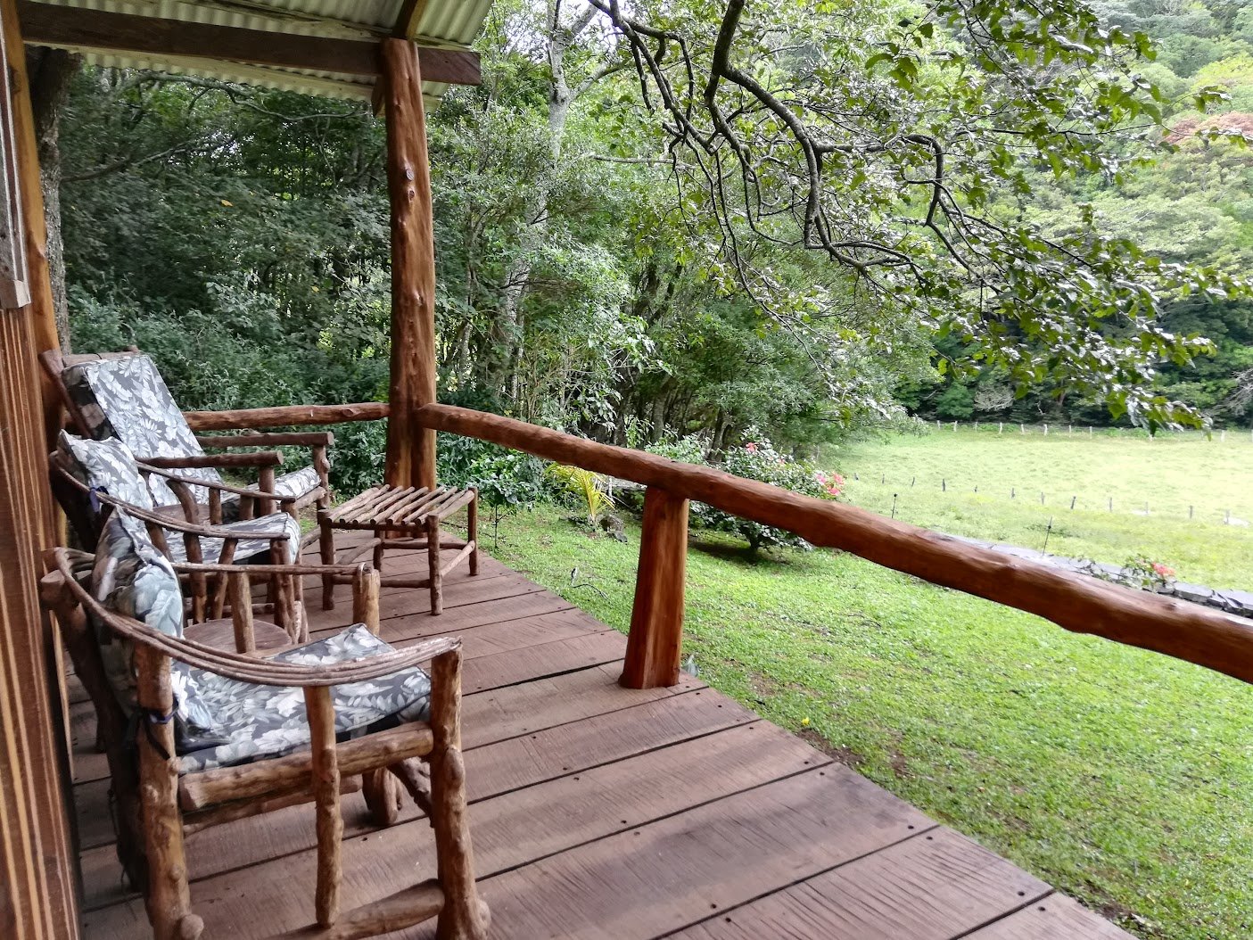 Bunkhouse porch with log furniture